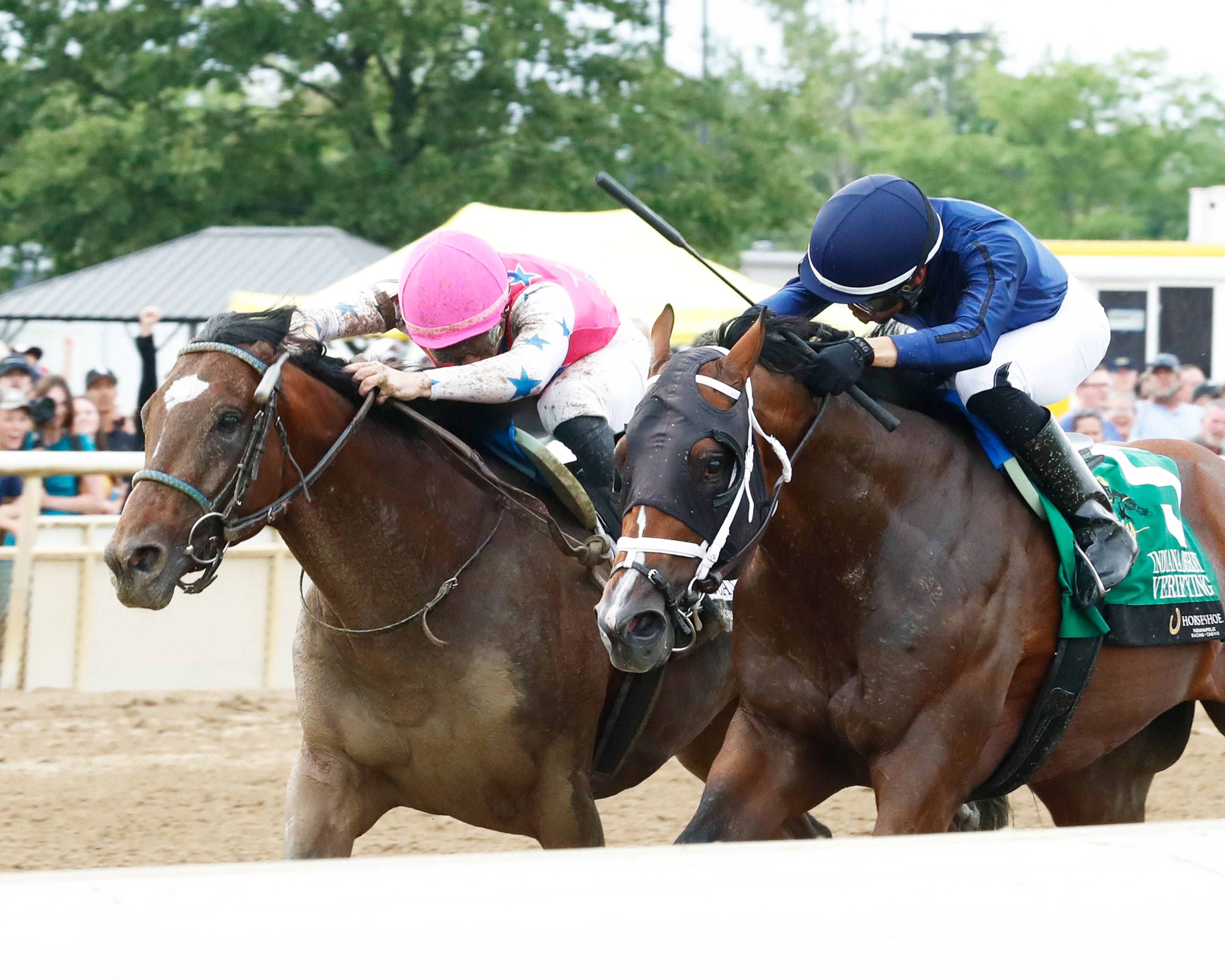 Verifying holds off Raise Cain by a nose in Indiana Derby